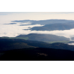 Wolken in den steilen Tälern am Südabfall Krušné hory